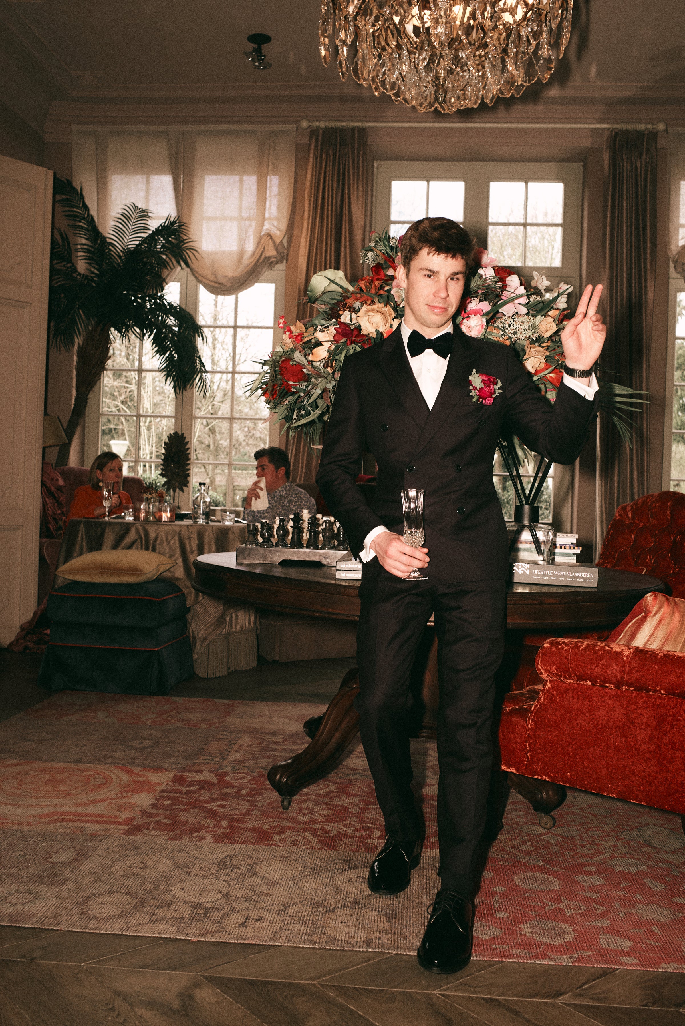 Groom wearing a bespoke wedding suit by Atelier ACÀN, crafted for a perfect fit.