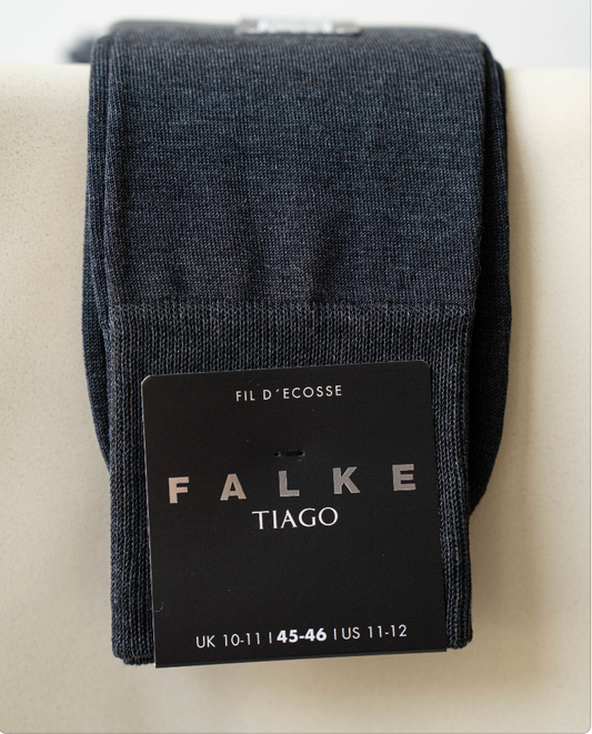 Dark gray Falke Tiago socks with brand label on a light background